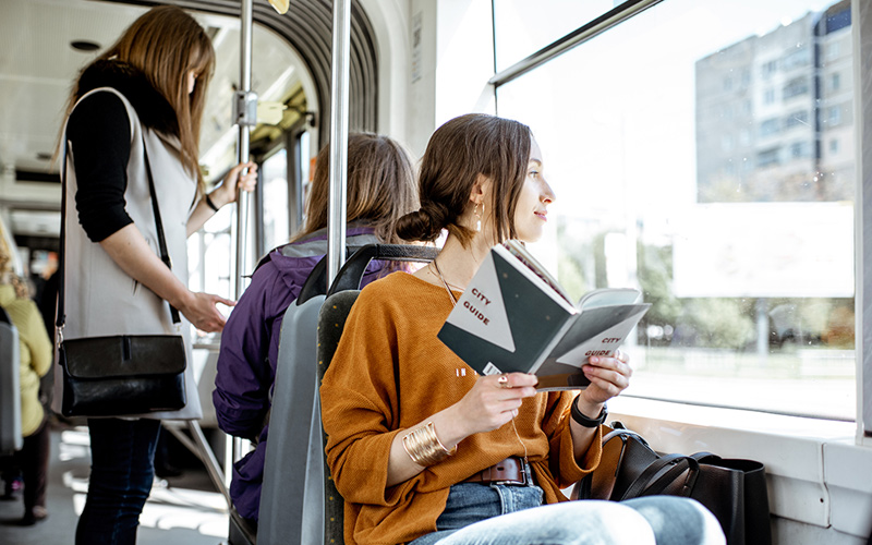 Woman sitting in a bus
