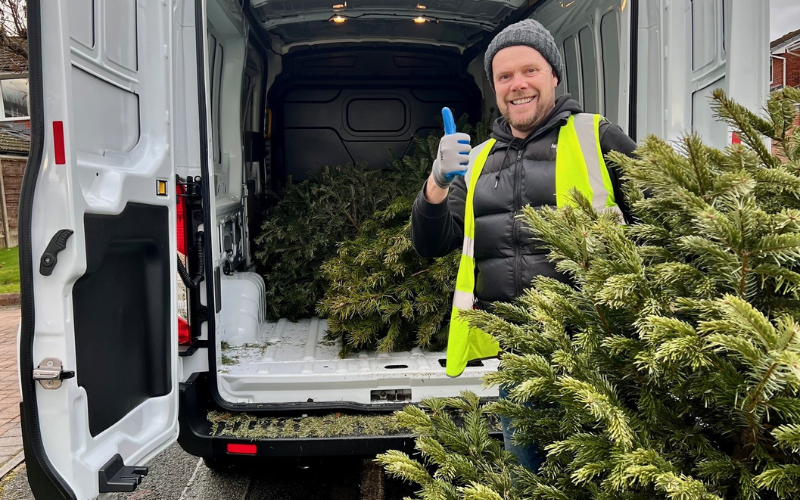 Alex Weston with a Christmas tree